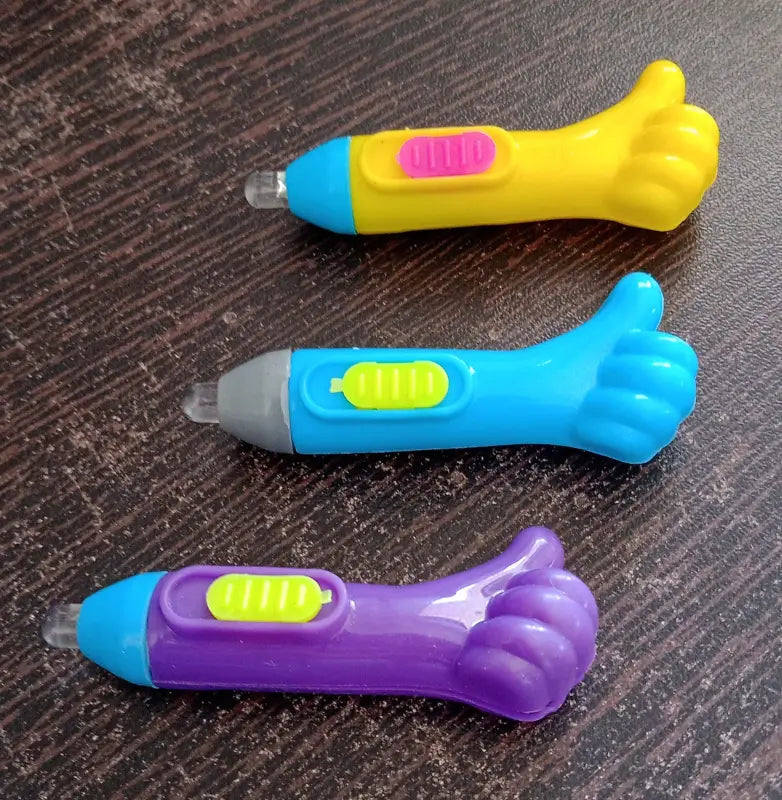 ThumbGlow LED Keychain Light – Thumb Shape Mini Flashlight